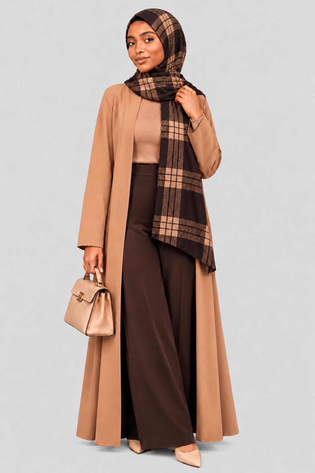 Woman wearing the brown and tan plaid hijab