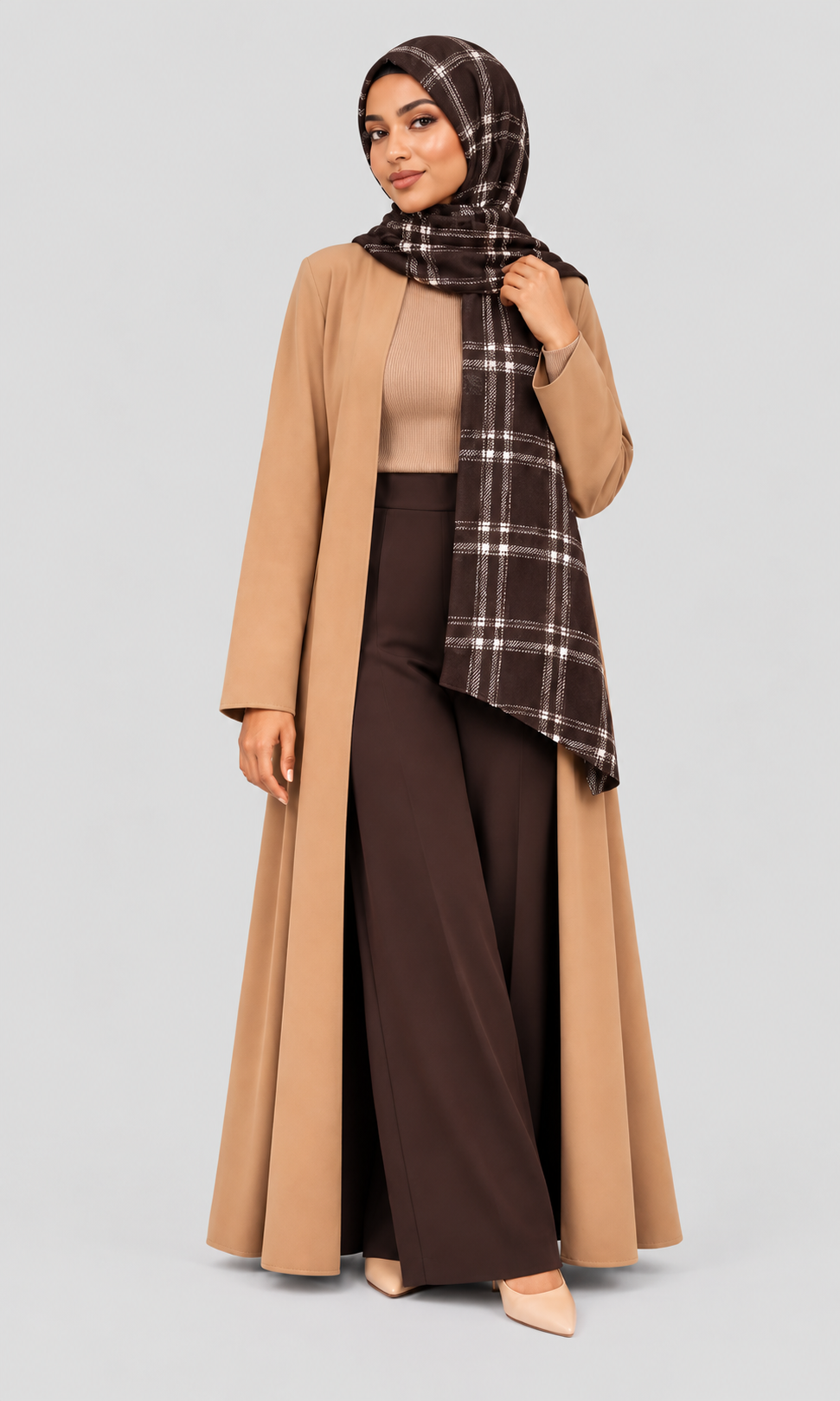 Woman wearing the dark brown plaid hijab